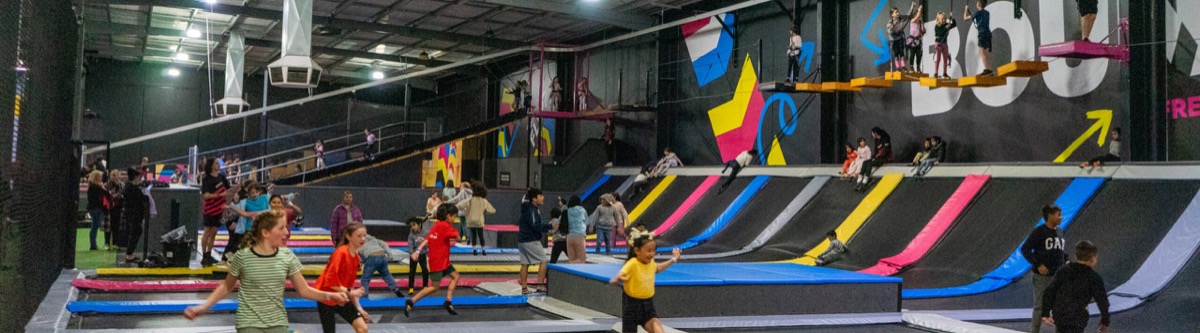 Children using the trampoline arena at BOUNCE Heidelberg